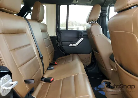 2011 Jeep Wrangler Unlimited Sahara from USA, damaged, VIN 1J4BA5H14BL572944